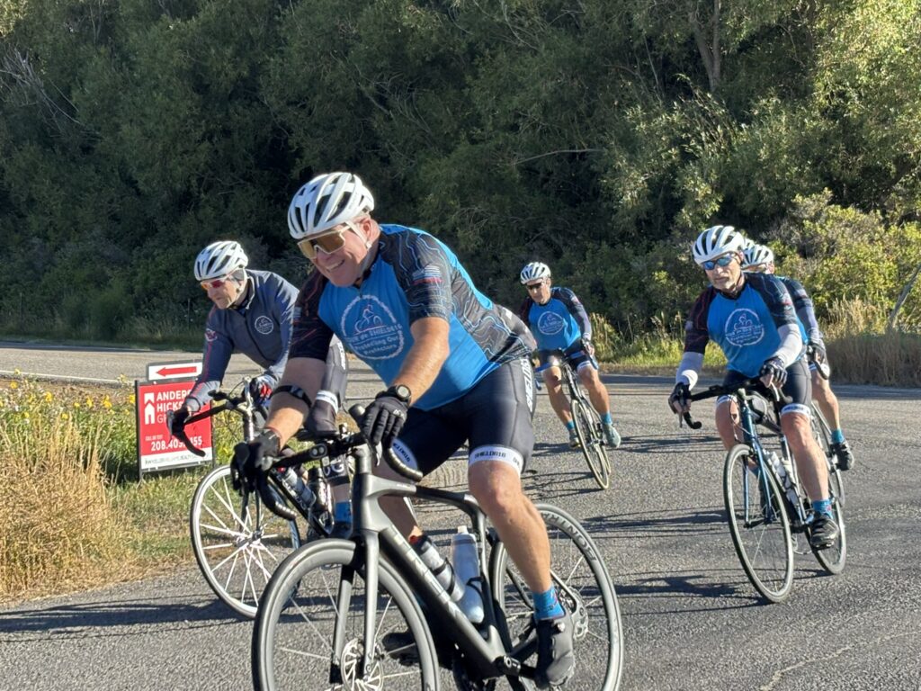 Bikers Rounding A Corner